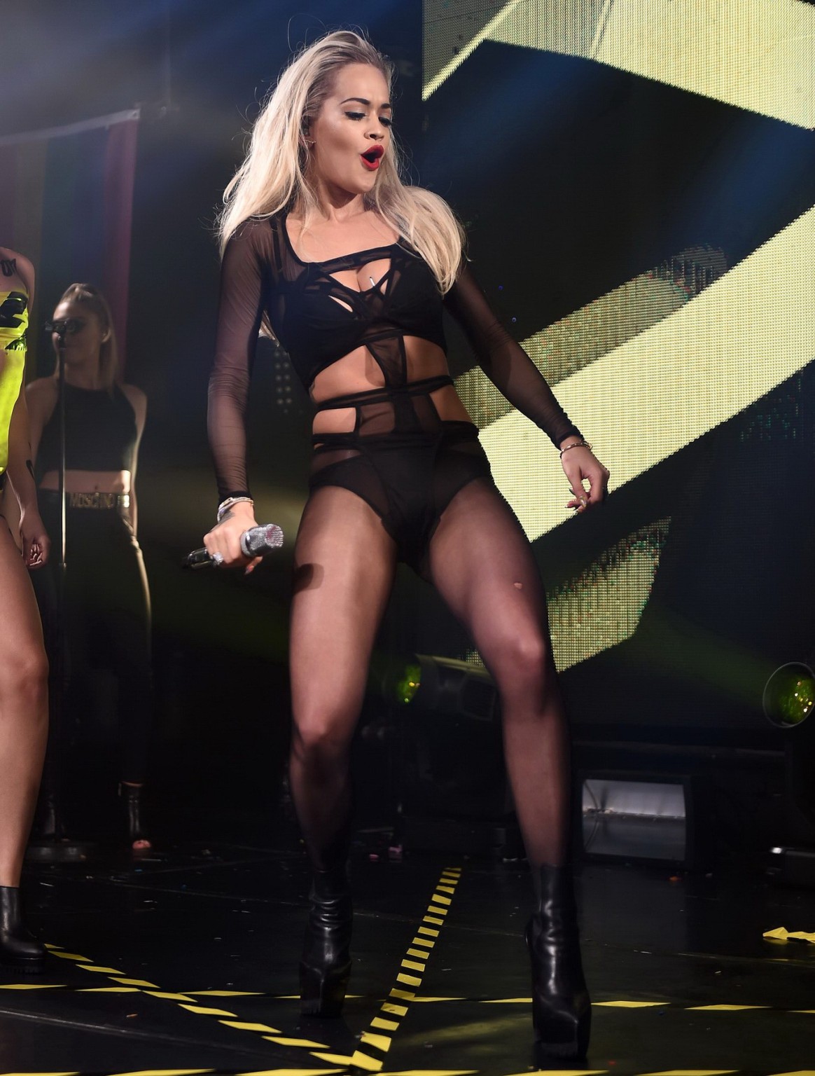 Rita Ora shows off her ass and cleavage in black bodysuit #75160121