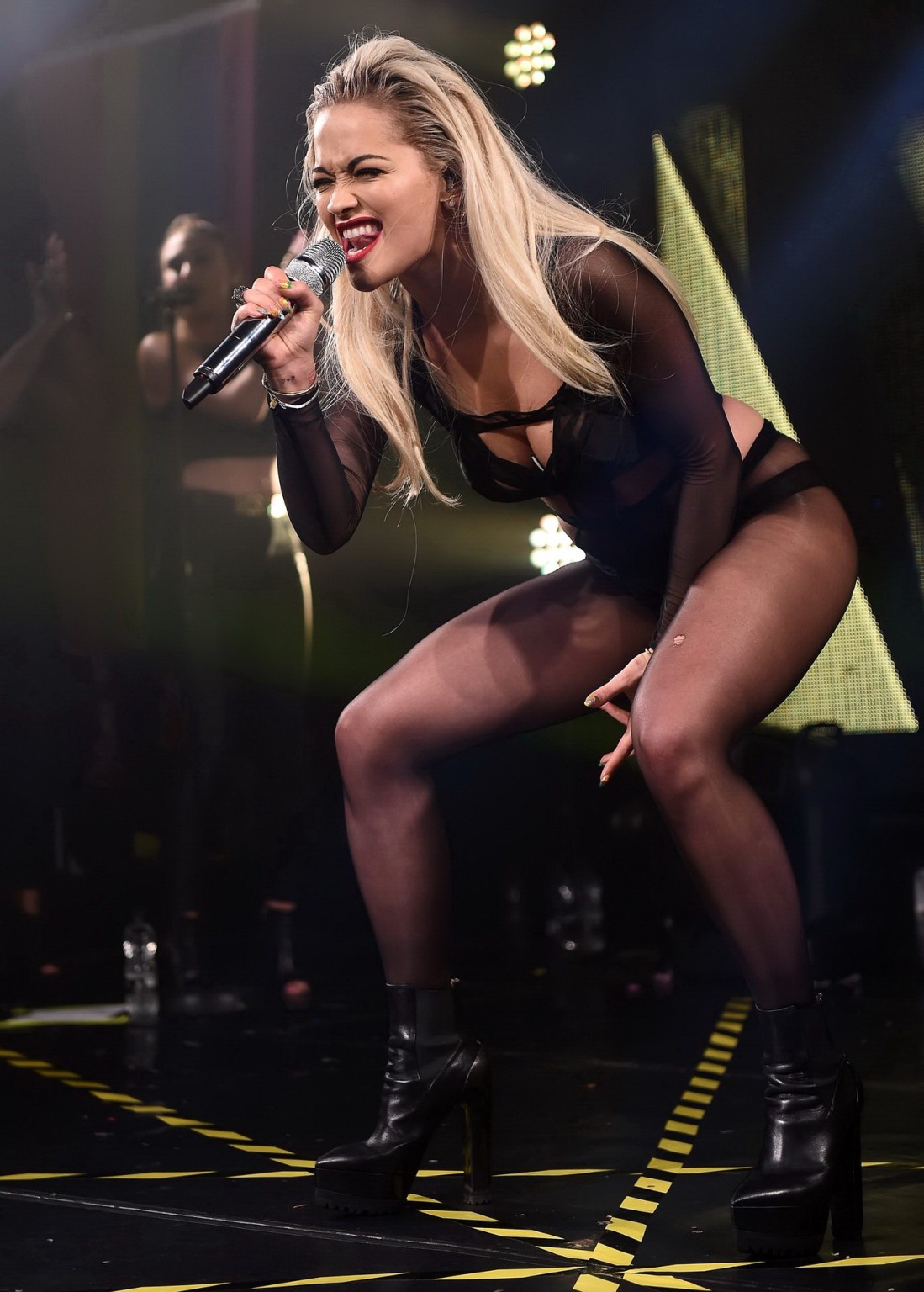 Rita Ora shows off her ass and cleavage in black bodysuit #75160178