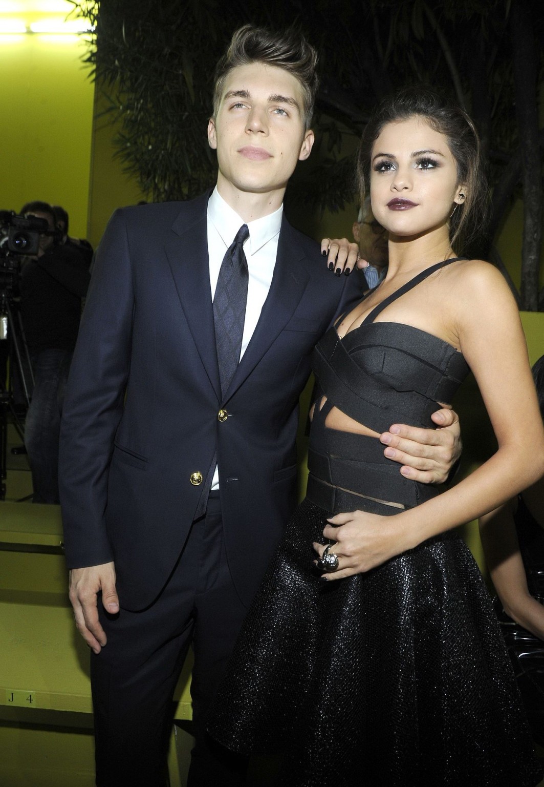Selena Gomez cleavy wearing a sexy black dress at Versace fashion show in Milan #75214544