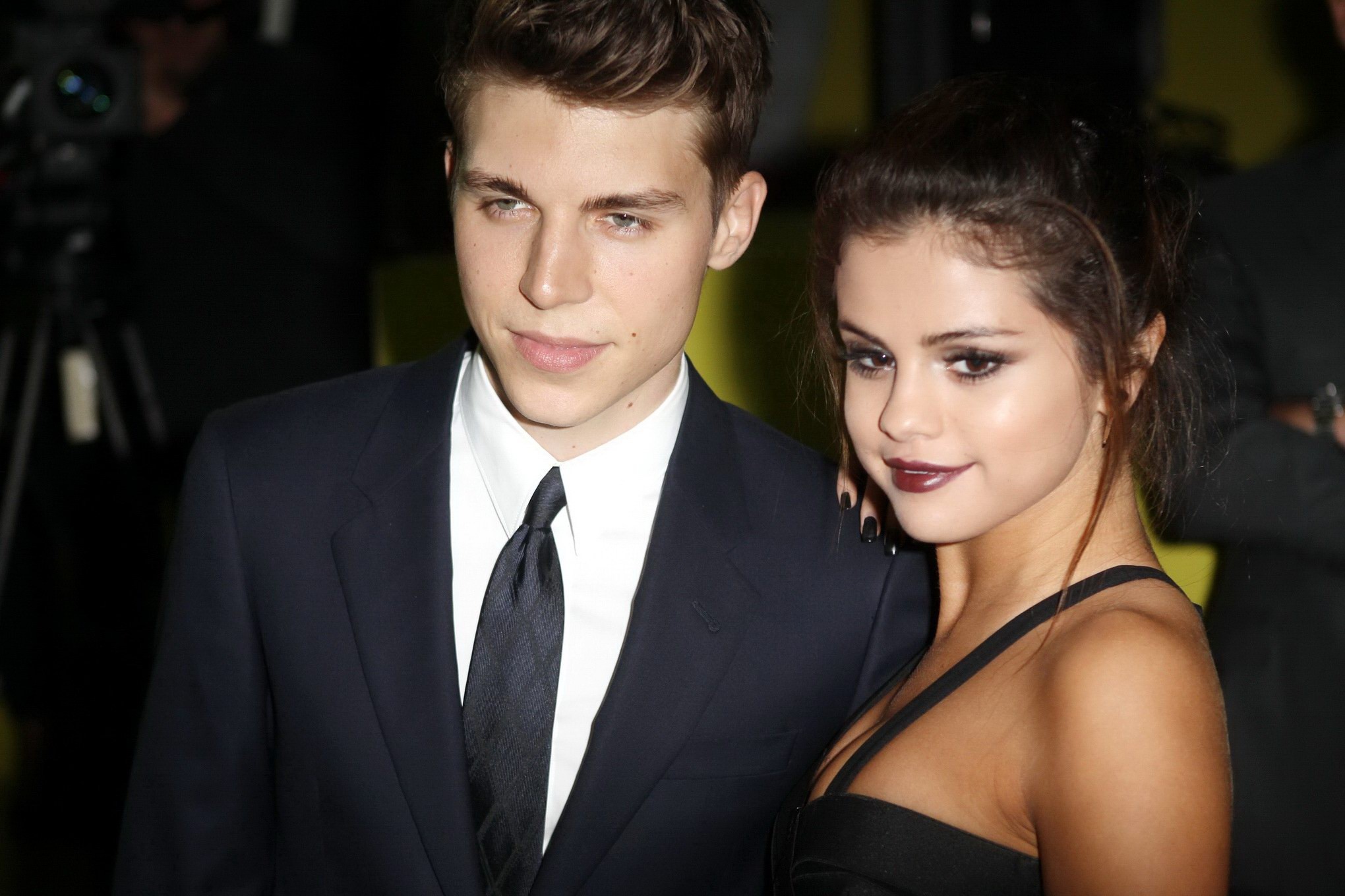 Selena Gomez cleavy wearing a sexy black dress at Versace fashion show in Milan #75214550