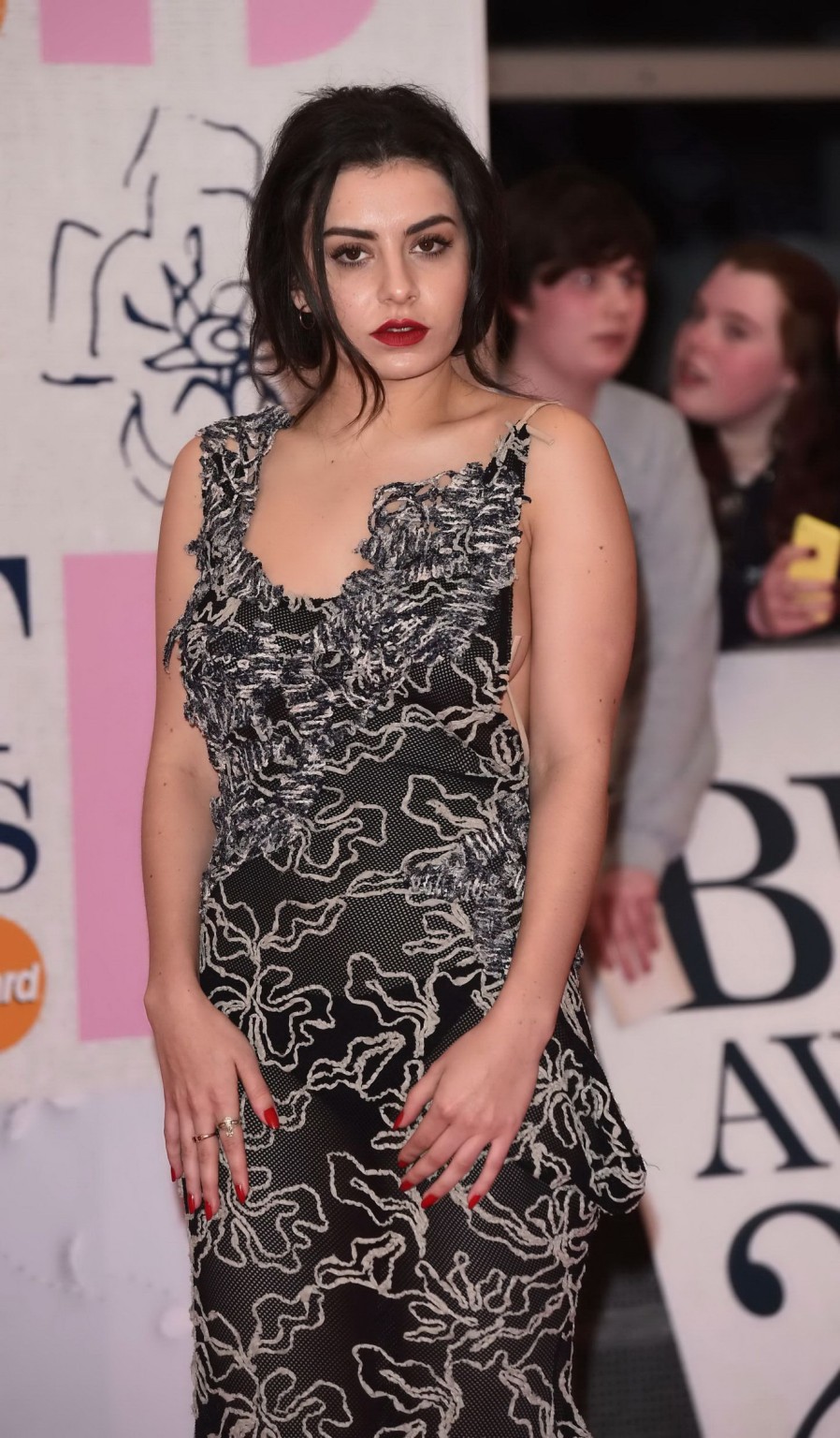 Charli XCX showing bare sideboob braless in monochrome backless dress at 2015 BR #75171547