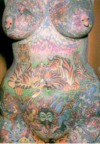 Extreme tattoo and piercing #76495909
