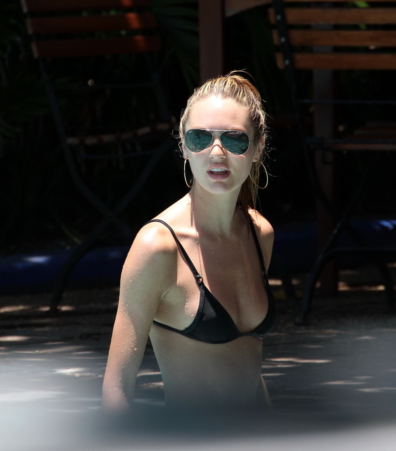 Candice Swanepoel in sexy black bikini petting with her boyfriend at the pool in #75231142