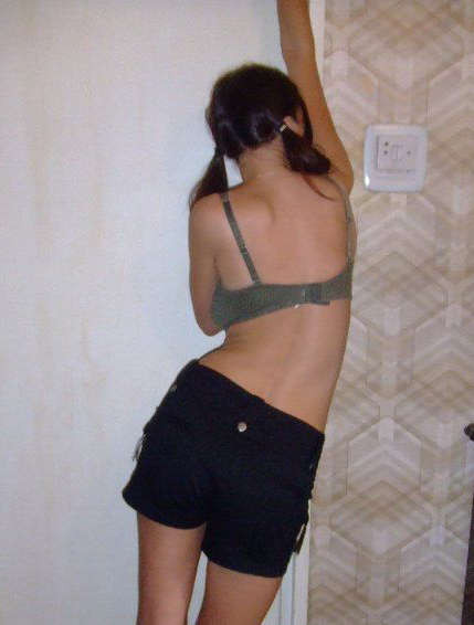 Photos of a dark-haired hottie who likes to tease the camera|http://galleries2.a #75704920