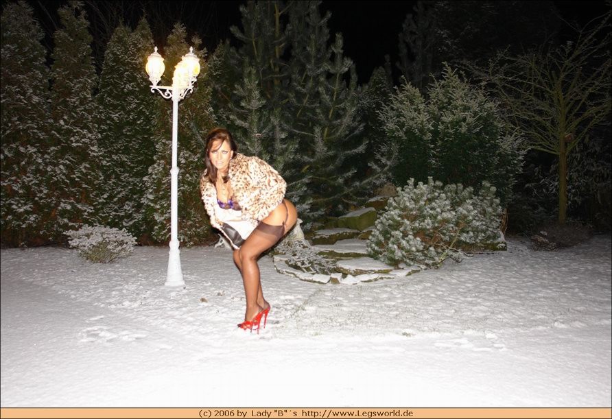 Amateur stockings lady in fur posing outdoor #78523214