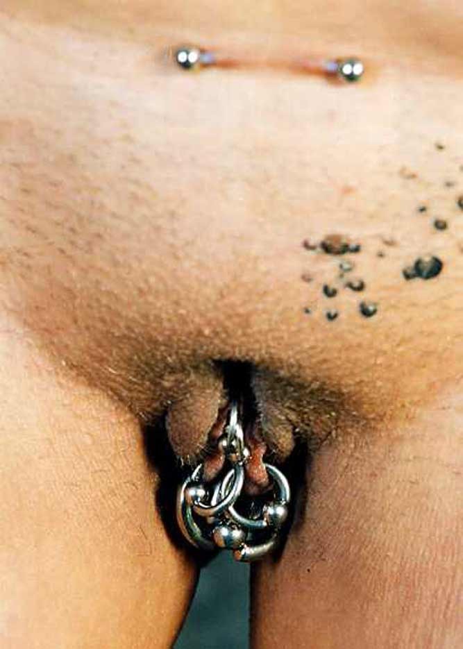 Extreme tattoo and piercing #76494878
