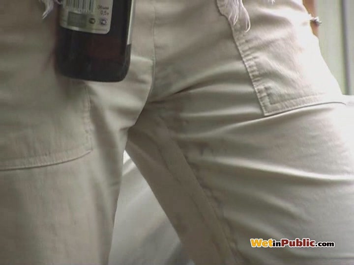 Blond has sipped some beer and pissed in her white breeches in public #78590947