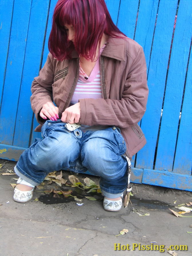 Nasty girl pulls down her jeans and empties her bladder in the street #76573684