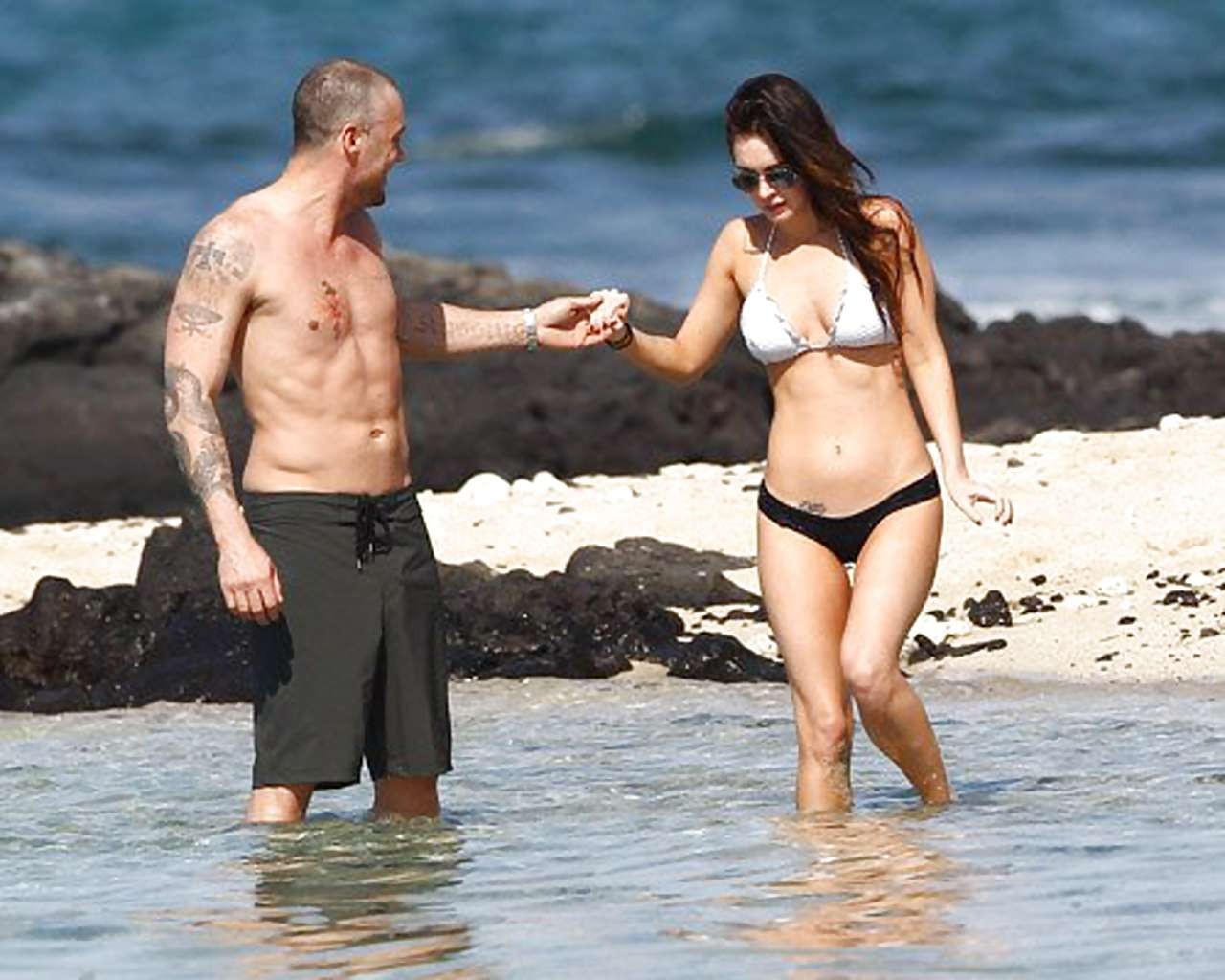 Megan Fox showing her sexy body curves in bikini paparazzi pictures #75273353