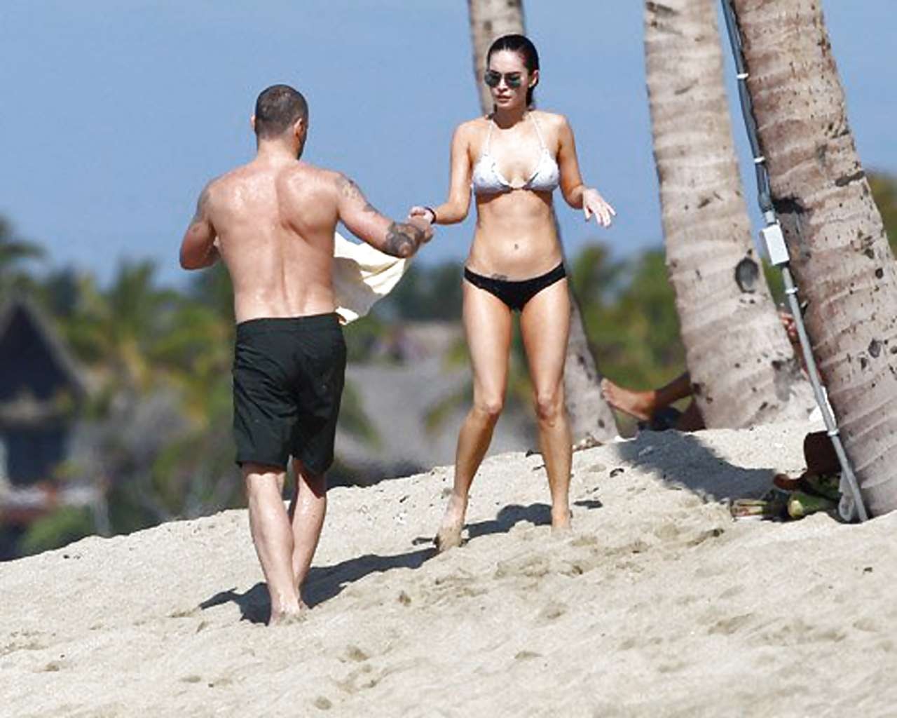 Megan Fox showing her sexy body curves in bikini paparazzi pictures #75273360