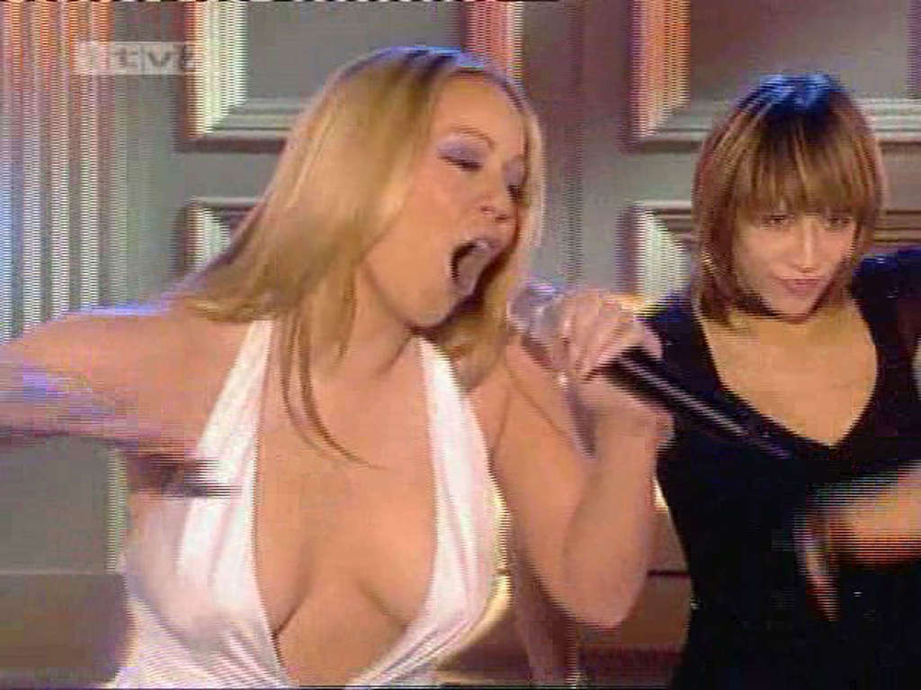 Mariah Carey posing and showing her amazing huge and sexy boobs  #75363170