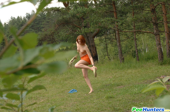 Closeup pics of a sexy redhead teen peeing outdoors #76601880