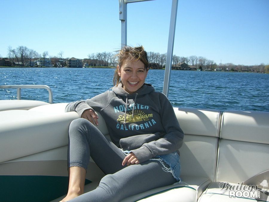 Bailey is a cute brunette with hard nipples posing on a boat #73135134
