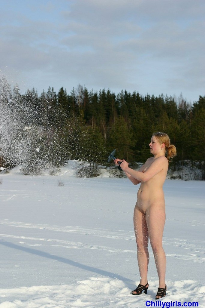 Naked winter girl freezing in the snow #73281164
