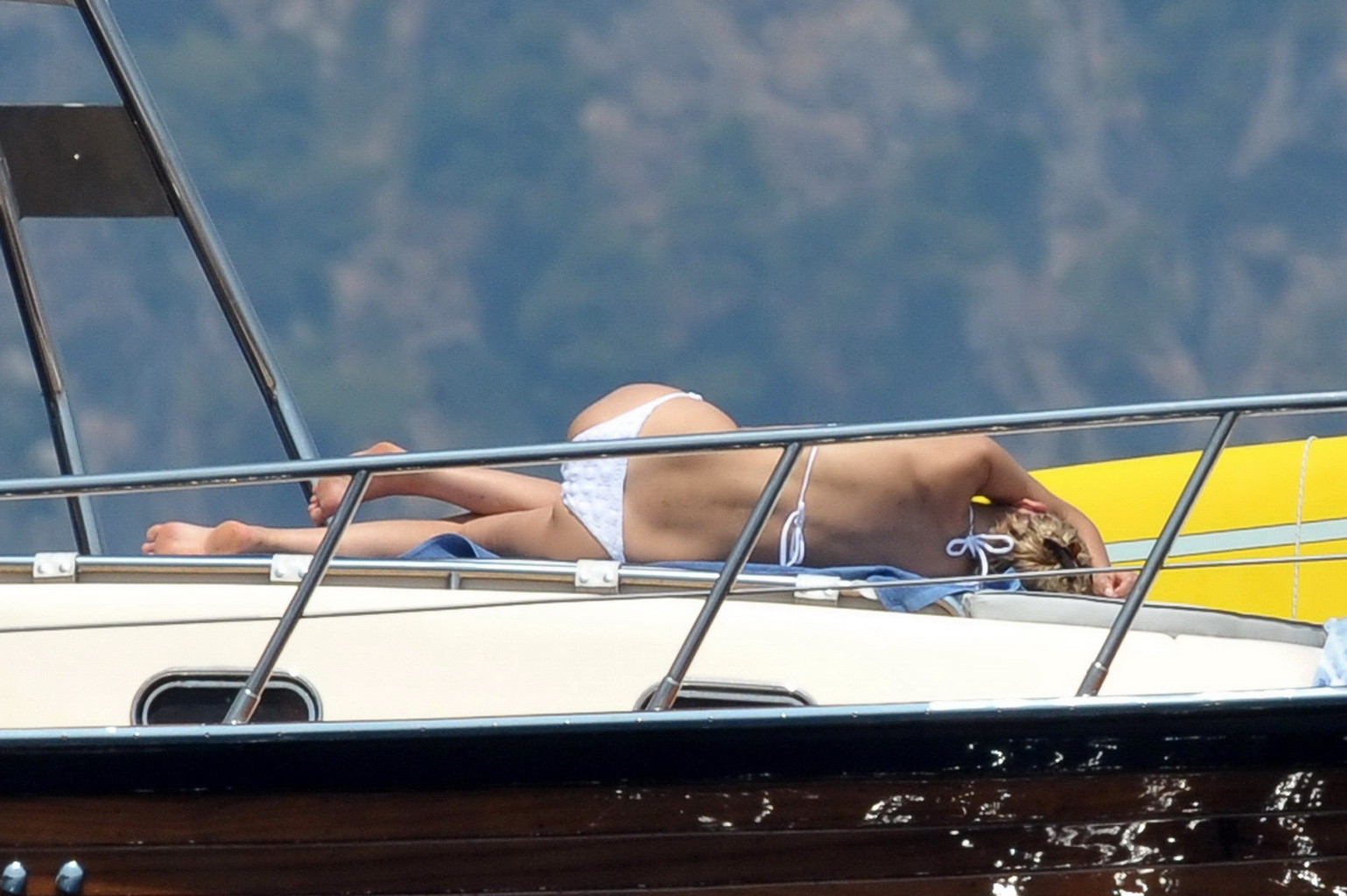 Sharon Stone tanning topless  showing ass crack on a yacht in Italy #75222945