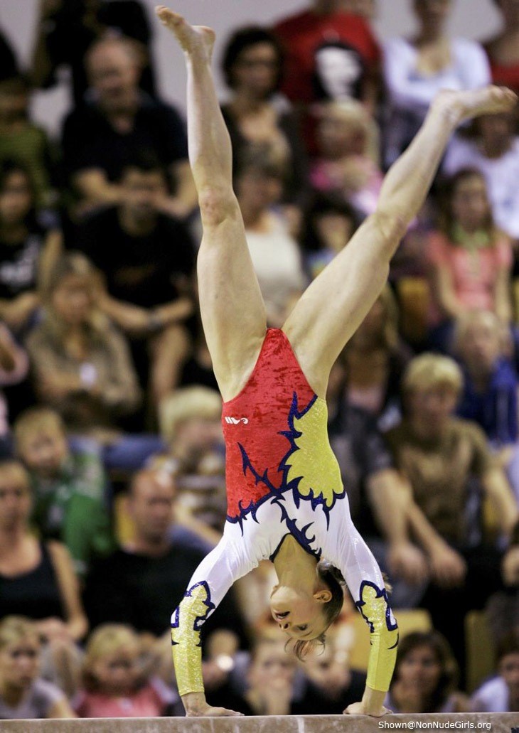 Gymnast spreading legs #75415534