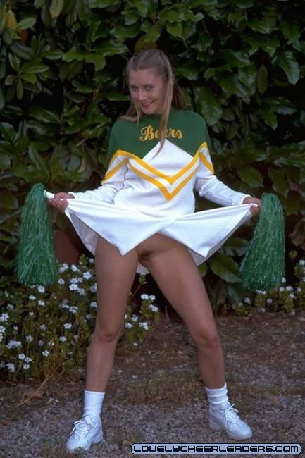 Sexy blonde Cheerleader Brandi stripping outdoors #73509989