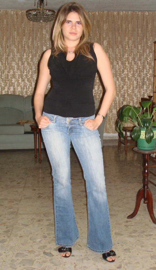 Amateur blonde girl in black lingerie taking off her blue jeans #68183043