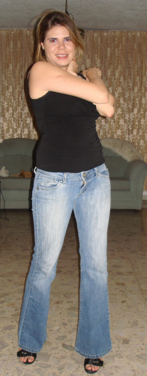 Amateur blonde girl in black lingerie taking off her blue jeans #68183110
