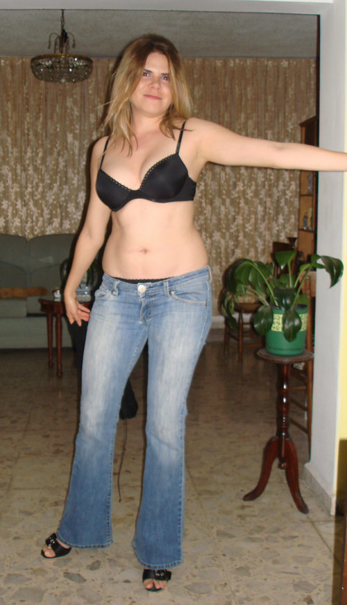 Amateur blonde girl in black lingerie taking off her blue jeans #68183138