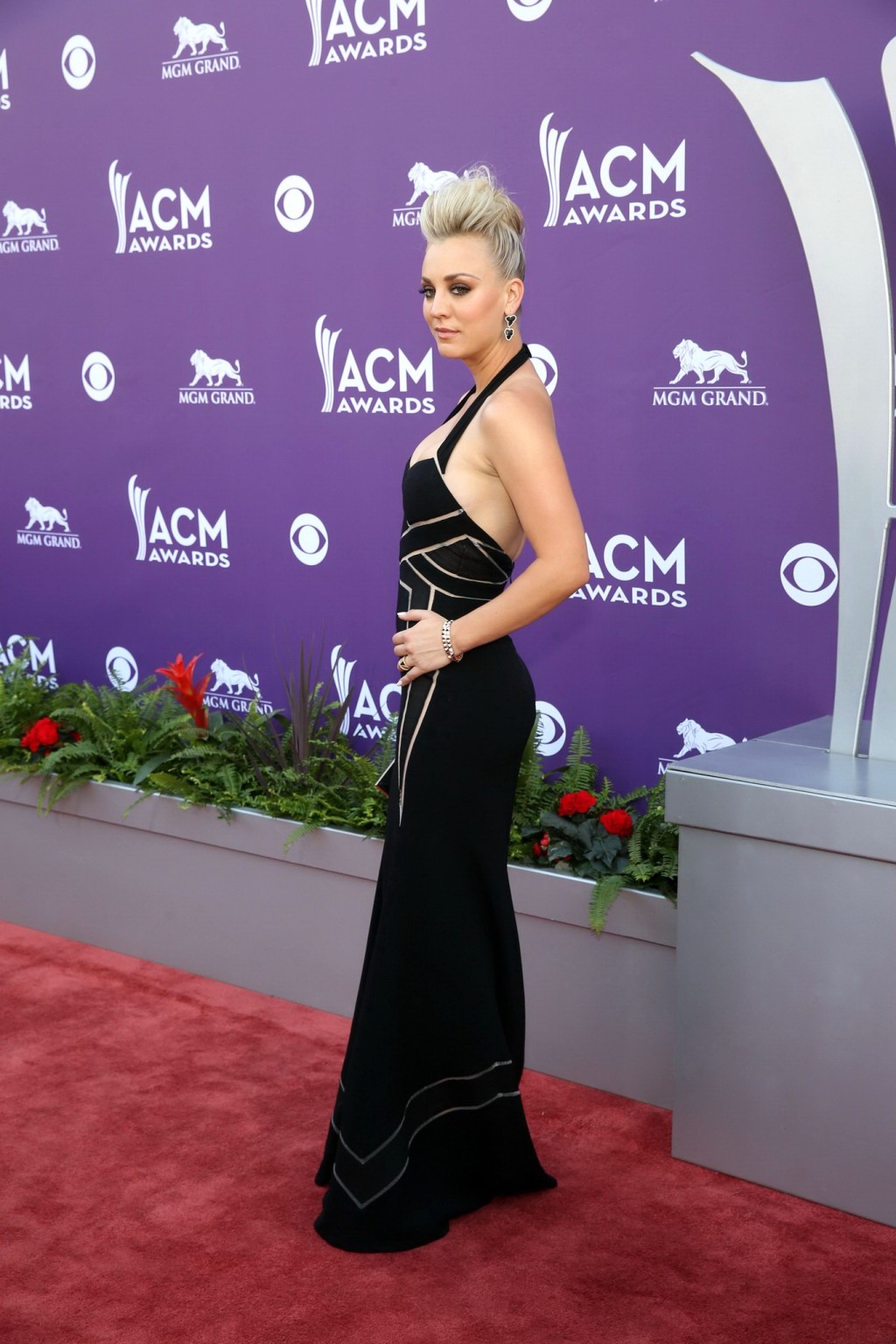 Kaley Cuoco shows cleavage wearing a low cut black dress at 48th Annual Academy  #75235778