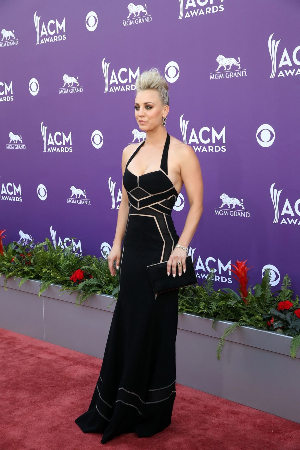 Kaley Cuoco shows cleavage wearing a low cut black dress at 48th Annual Academy  #75235796