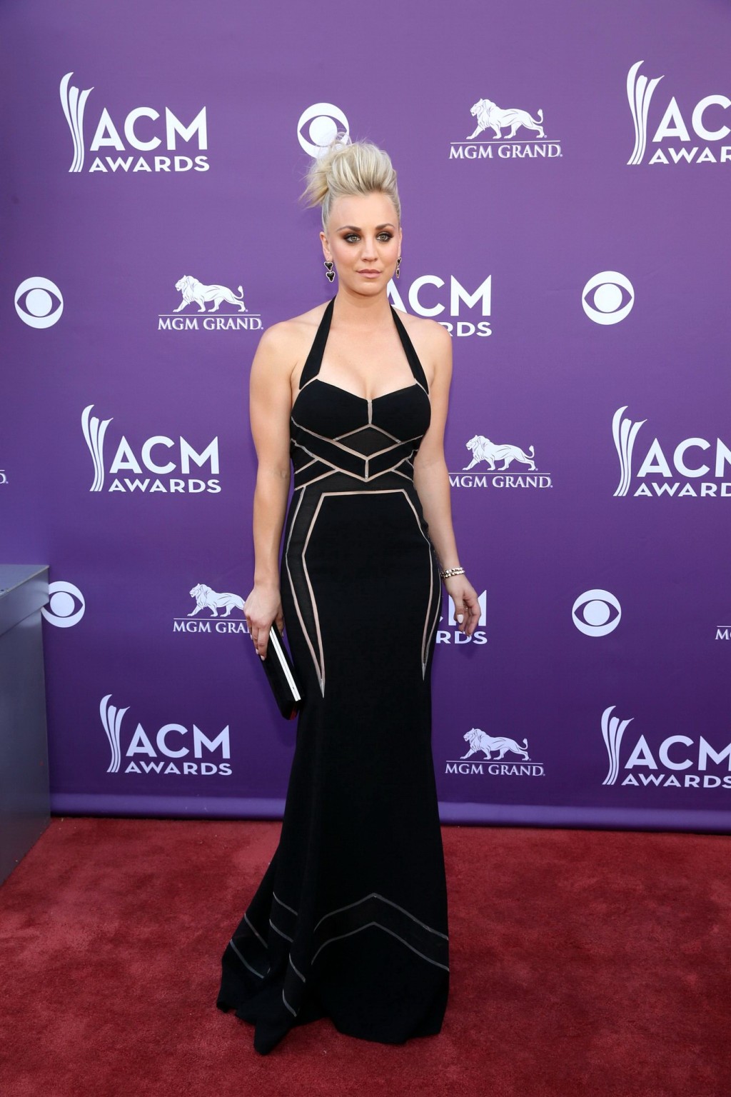 Kaley Cuoco shows cleavage wearing a low cut black dress at 48th Annual Academy  #75235851