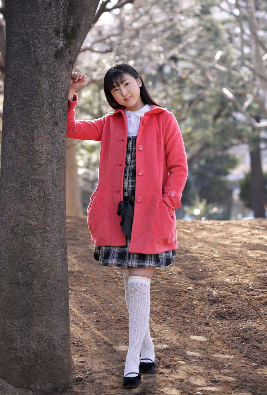 Japanese tramp poses in her school uniform as she waits #69937418