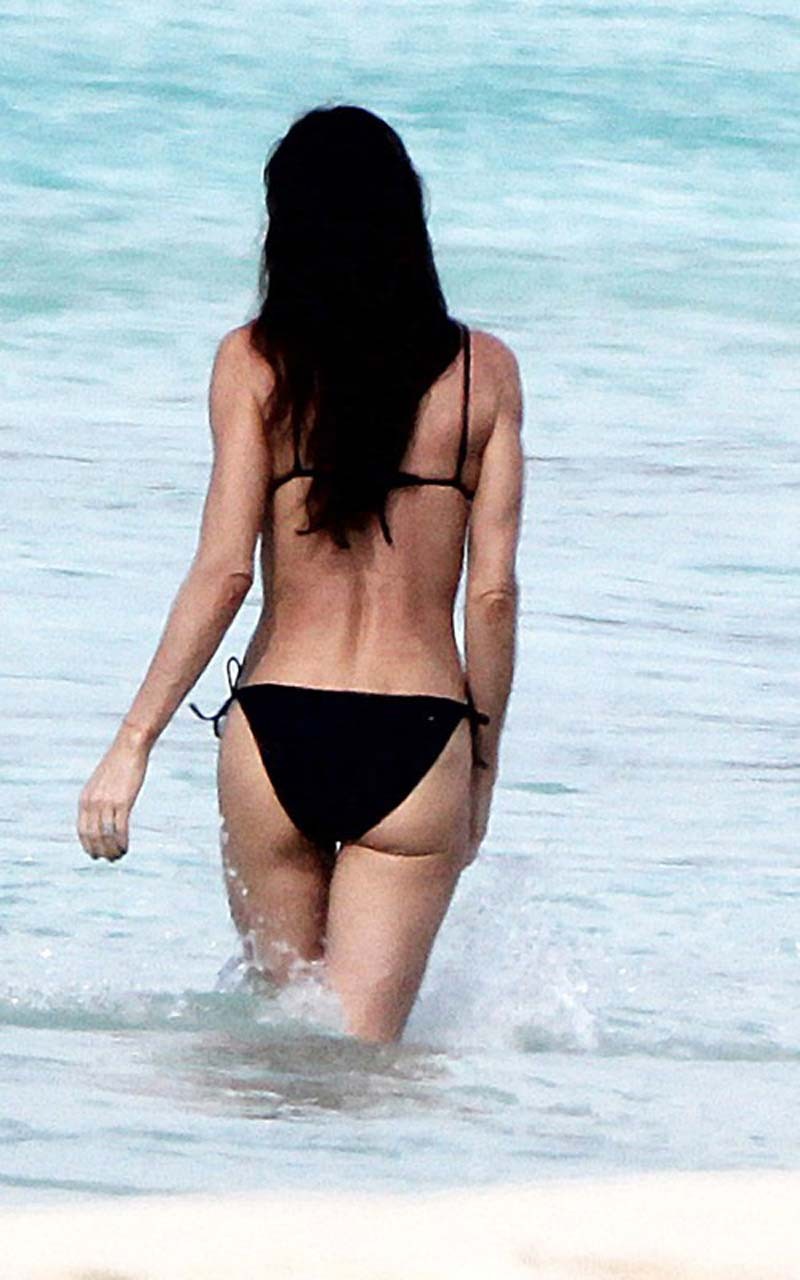 Demi Moore exposing her nice and sexy body in black bikini on beach paparazzi pi #75317220