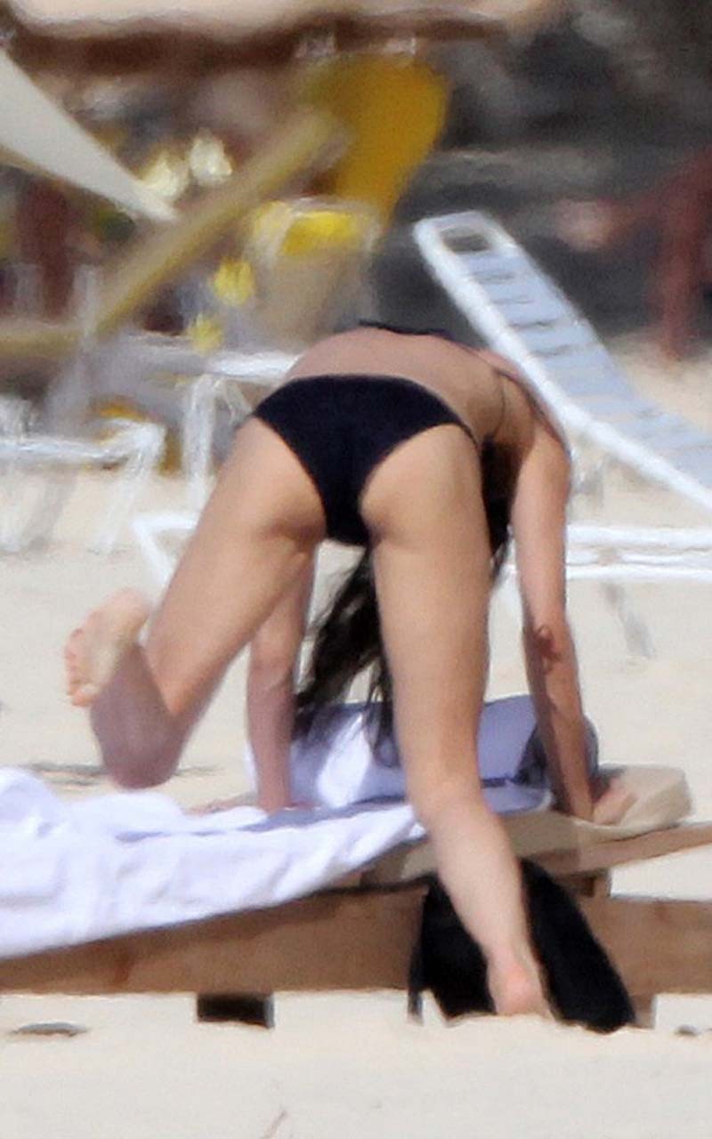 Demi Moore exposing her nice and sexy body in black bikini on beach paparazzi pi #75317225