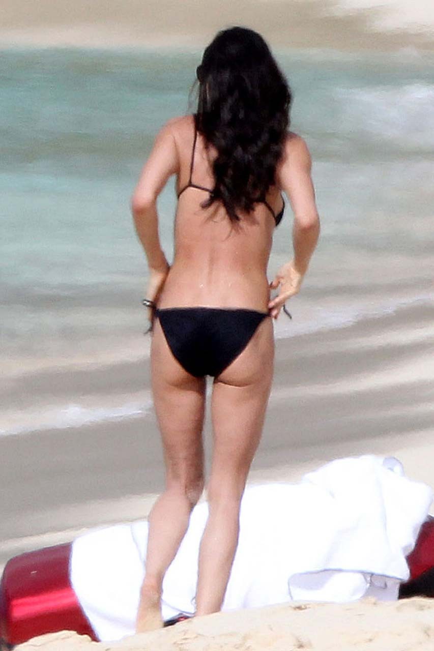 Demi Moore exposing her nice and sexy body in black bikini on beach paparazzi pi #75317233