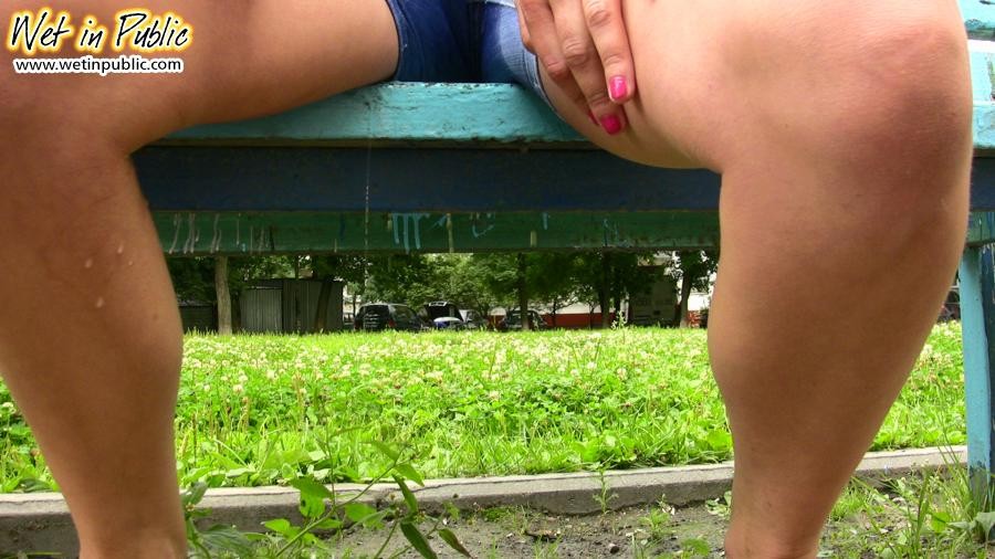 Curvy bitchie in the jean shorts pissed herself confusedly on a bench #73241031