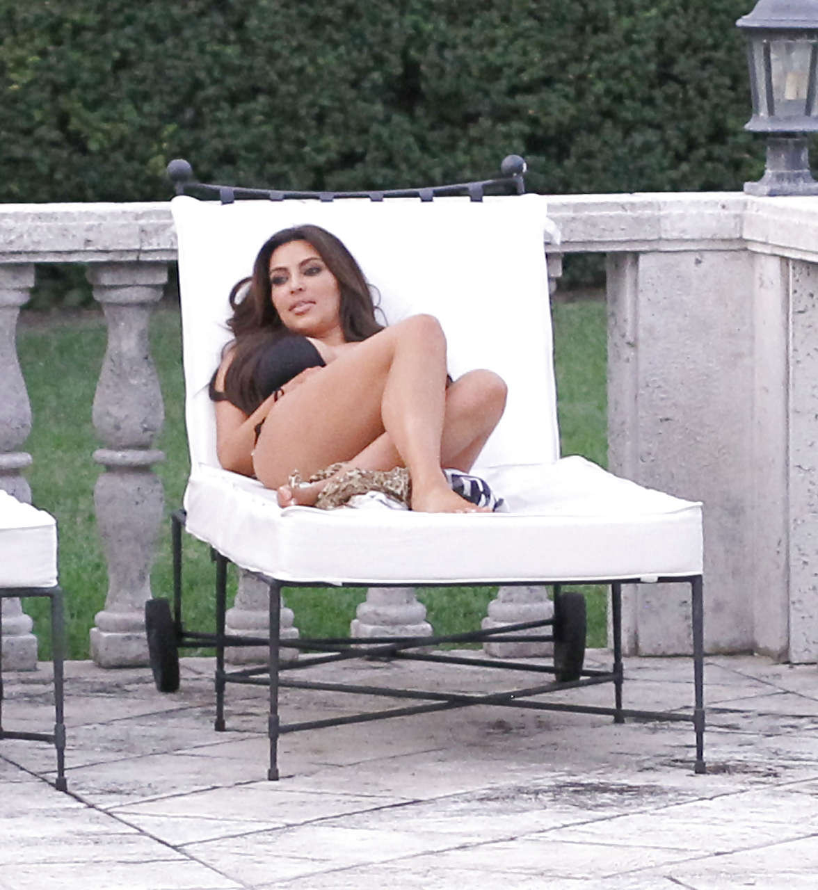 Kim Kardashian showing her sexy body curves in bikini paparazzi pictures #75273477