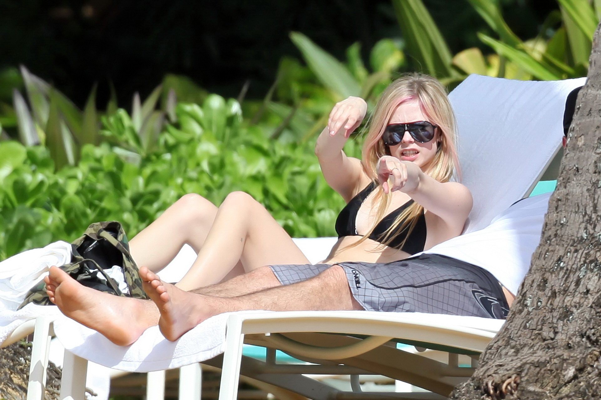 Avril Lavigne caught tanning in Hawaii wearing sexy black bikini #75321701