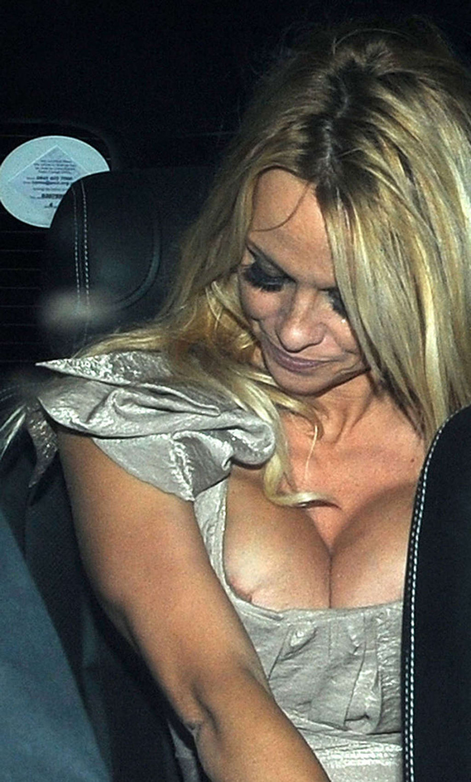 Pamela Anderson posing and showing her extremely huge boobs #75359468