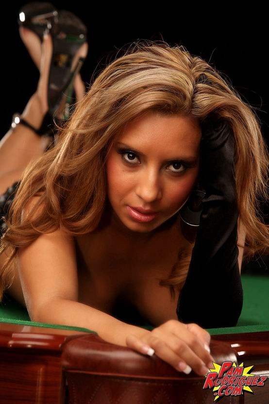 sexy latina babe posing on a pool table #72816511