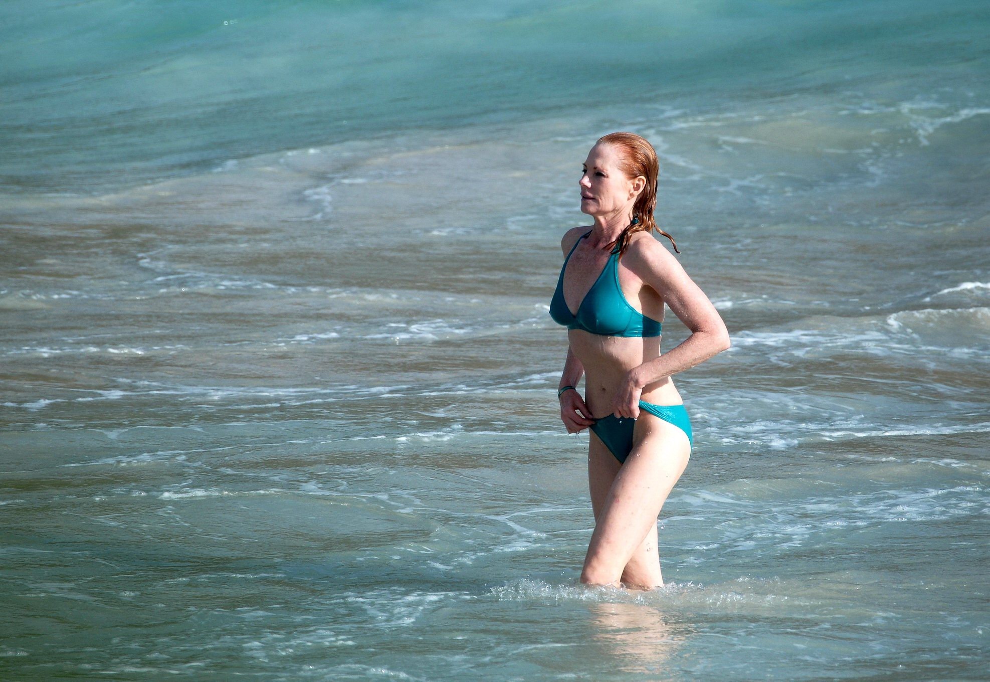 Marg Helgenberger wearing a turquoise bikini on a beach in St.Barts #75208463