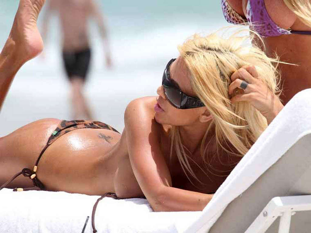 Shauna Sand with girlfriend posing topless and in bikini on beach paparazzi pict #75349781