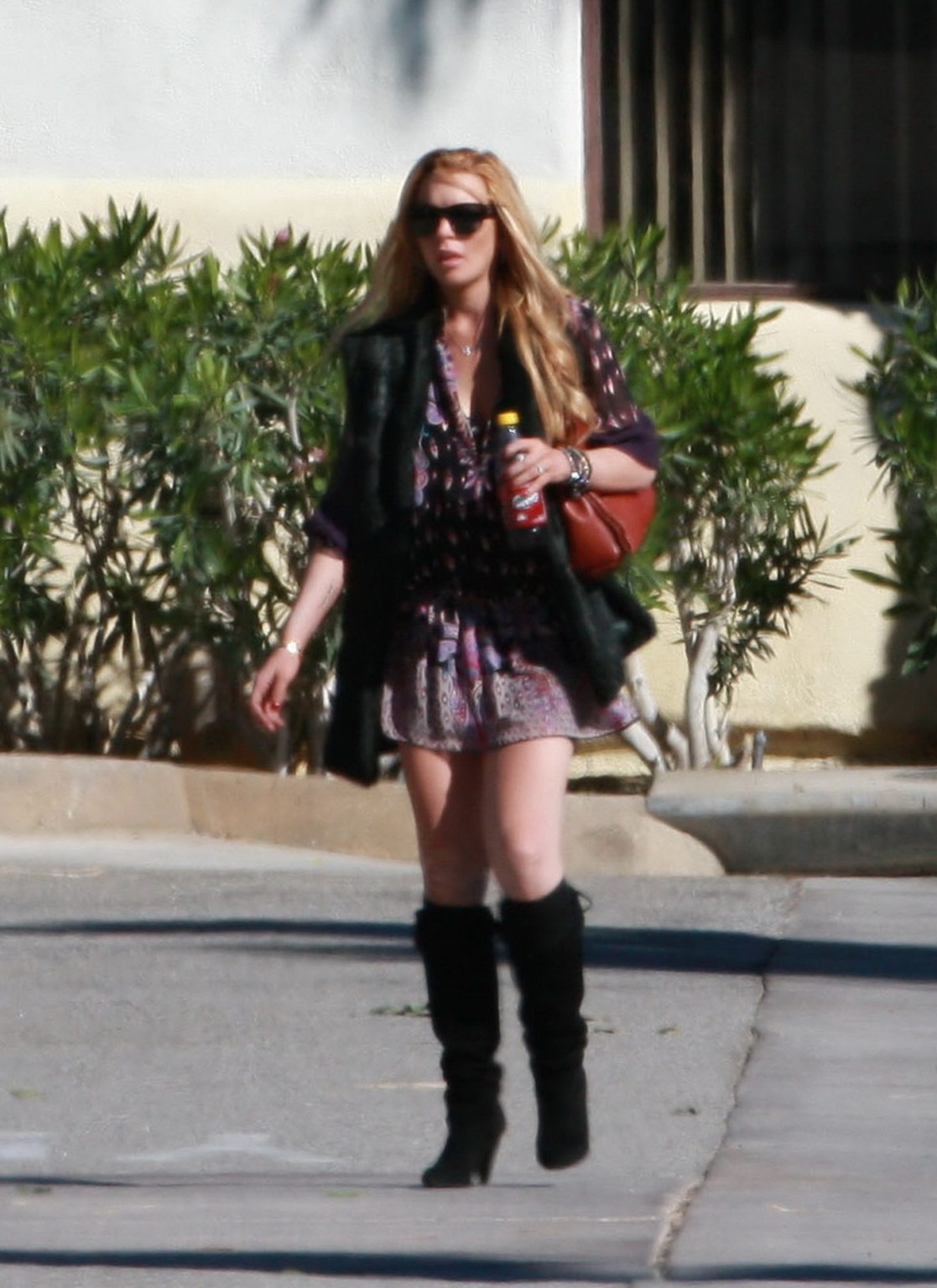 Lindsay Lohan leggy wearing mini skirt  fuck me boots outside Rancho Mirage #75325238