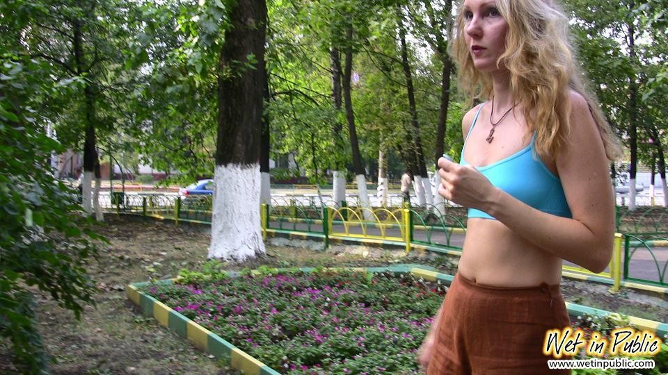 Blonde addicted to public pissing makes her pants all wet in a park #78595366
