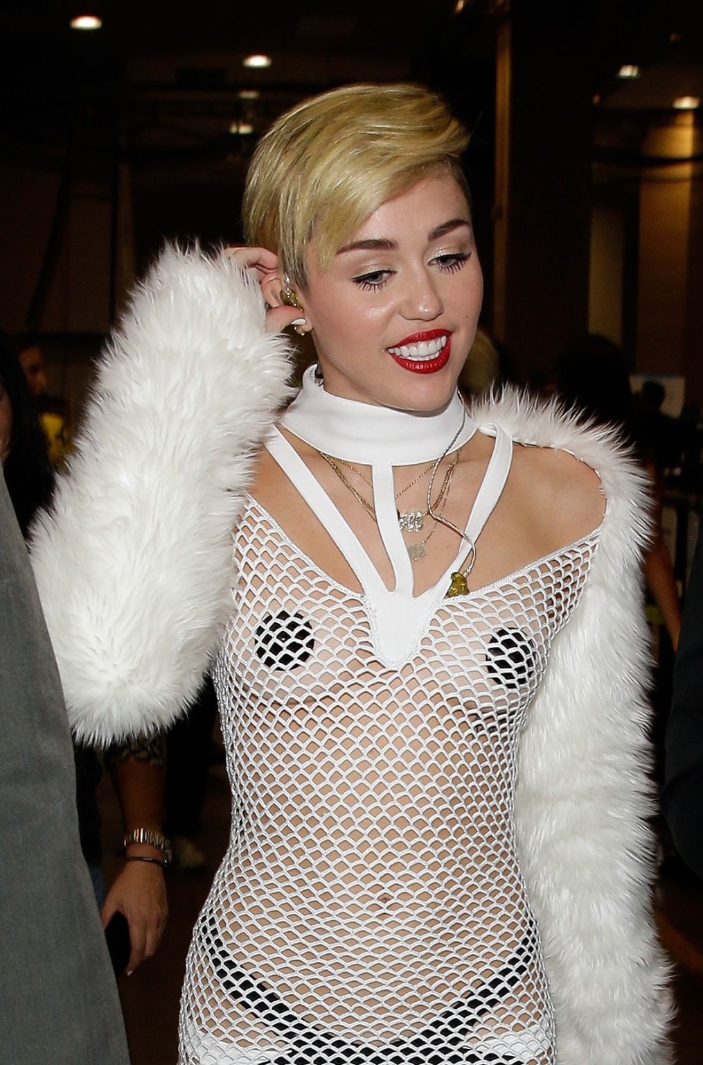 Miley Cyrus wearing pasties  fishnet at the  iHeartRadio Music Festival in Las V #75218086