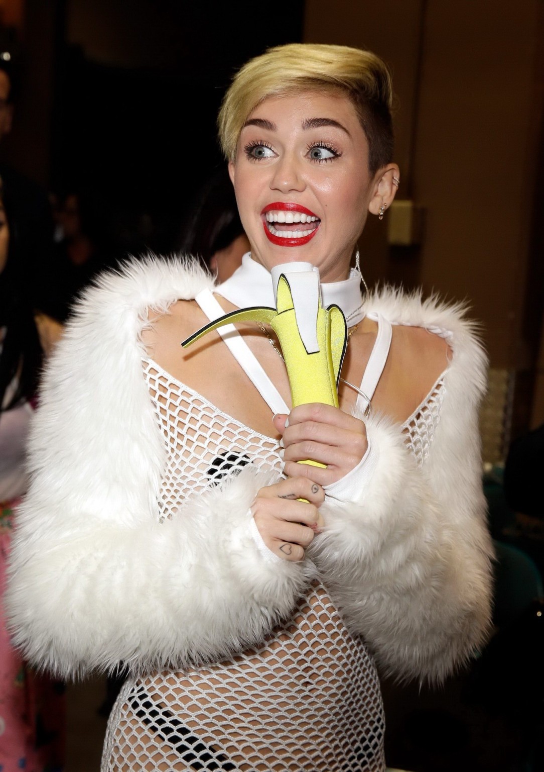 Miley Cyrus wearing pasties  fishnet at the  iHeartRadio Music Festival in Las V #75218150