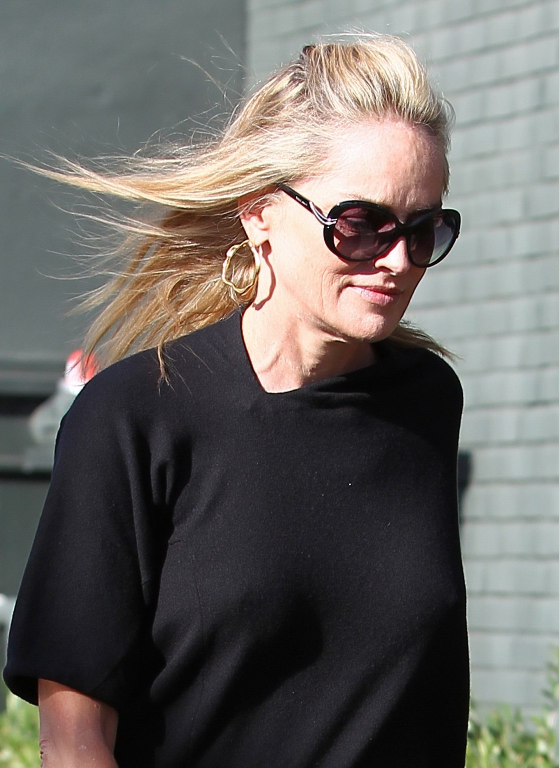 Sharon Stone braless showing pokies outside the Tavern in Brentwood #75283844