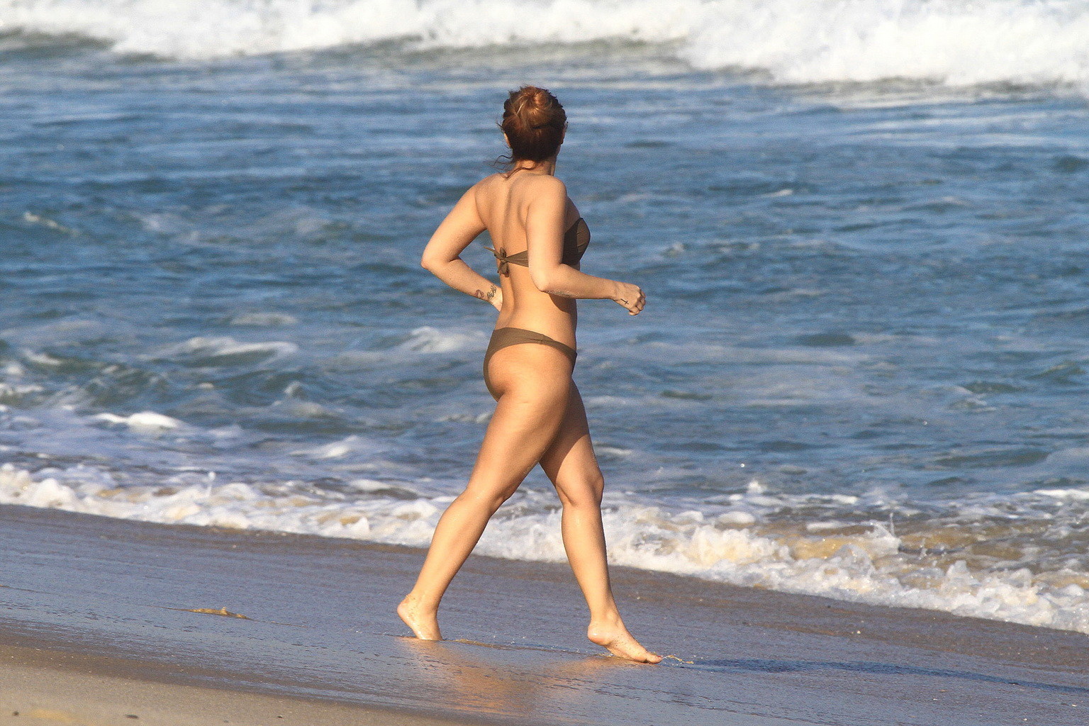 Booty babe Demi Lovato hiding her small tits in bikini at the beach in Brazil #75265665