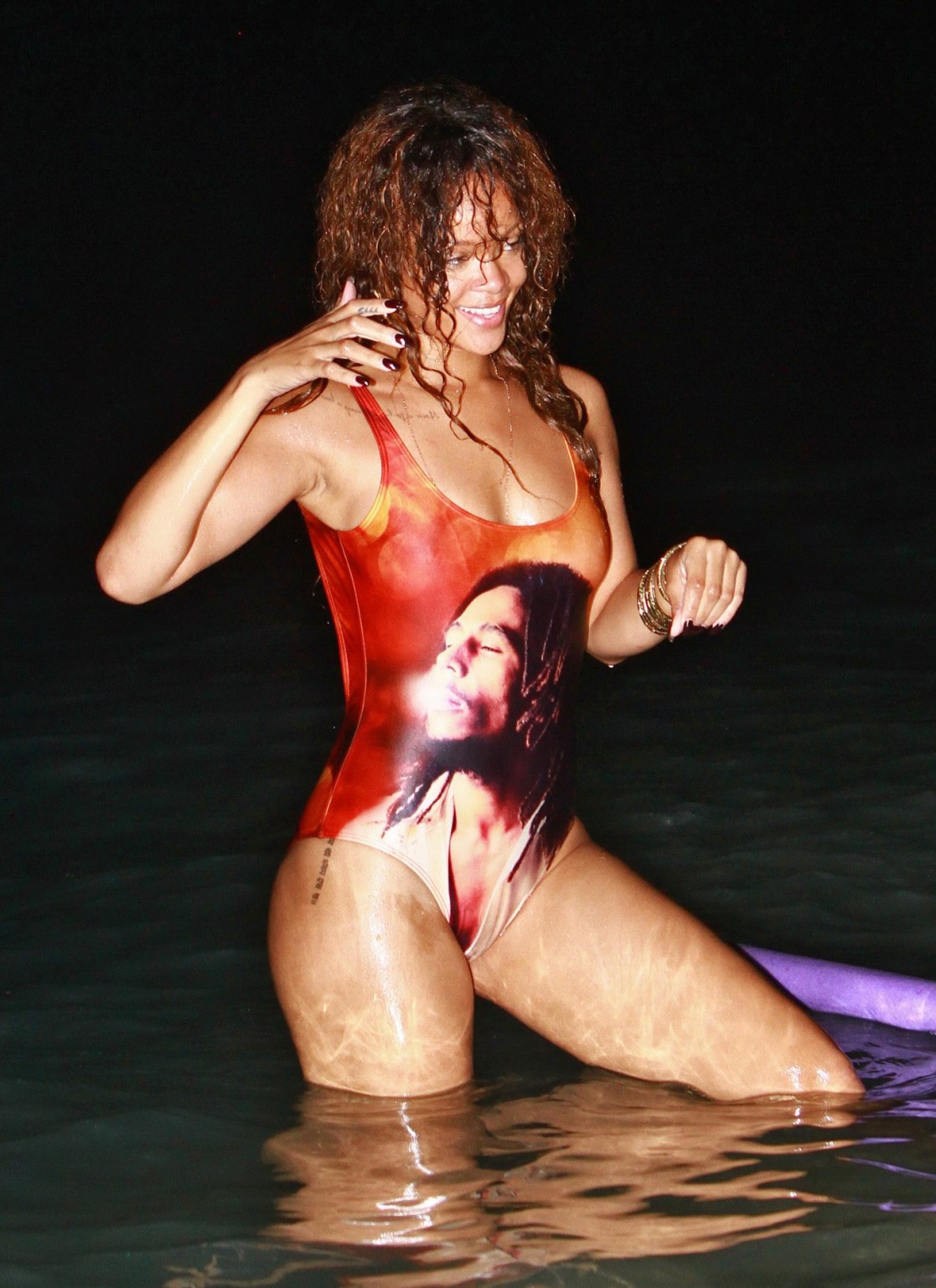 Rihanna in sexy swimsuit going for a dusk swim in Barbados #75292867