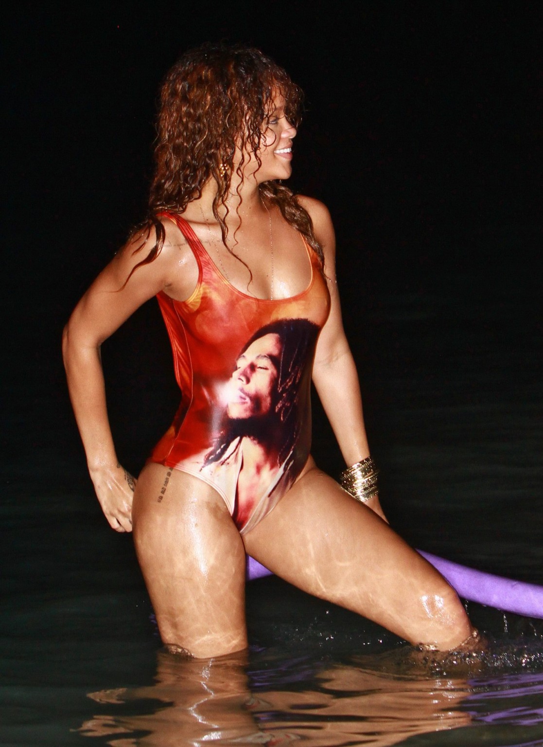 Rihanna in sexy swimsuit going for a dusk swim in Barbados #75292881