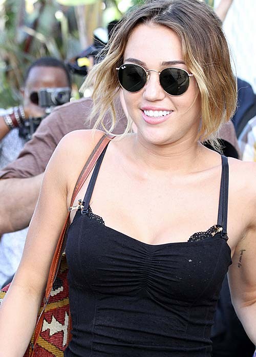Miley Cyrus the hottest paparazzi upskirt ever seen on street #75267614