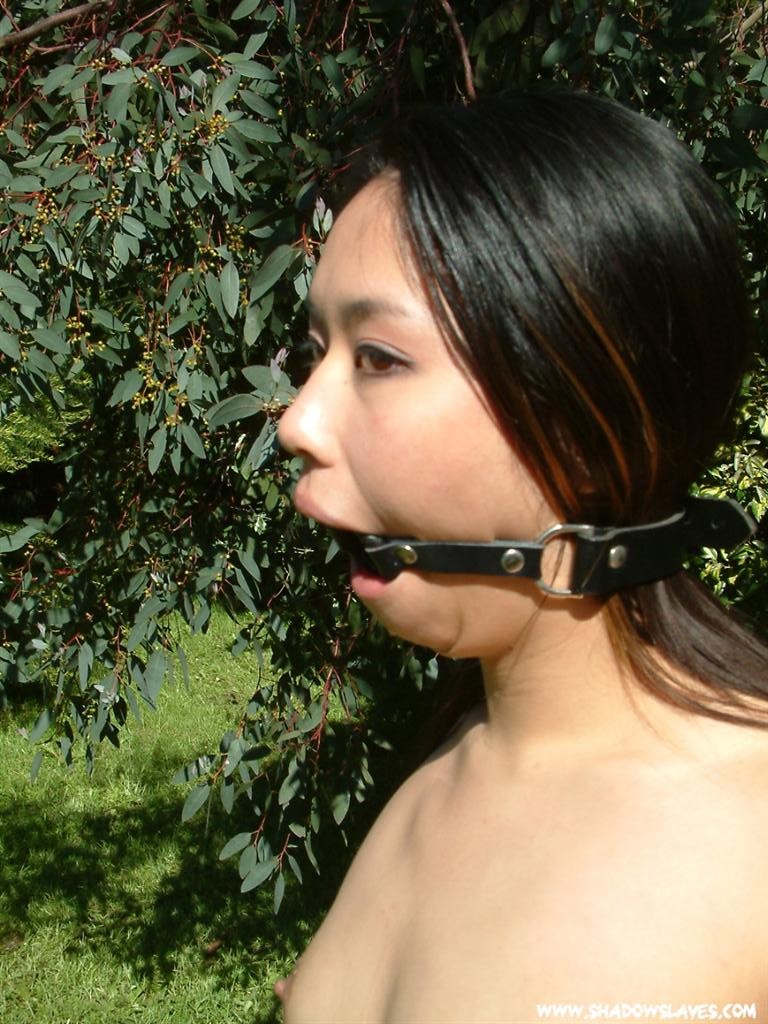 Oriental slave tied up outside and hosed down #72212874