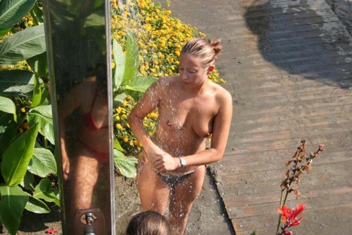 Lengthy haired hottie shows her merchandise at the beach #72249527