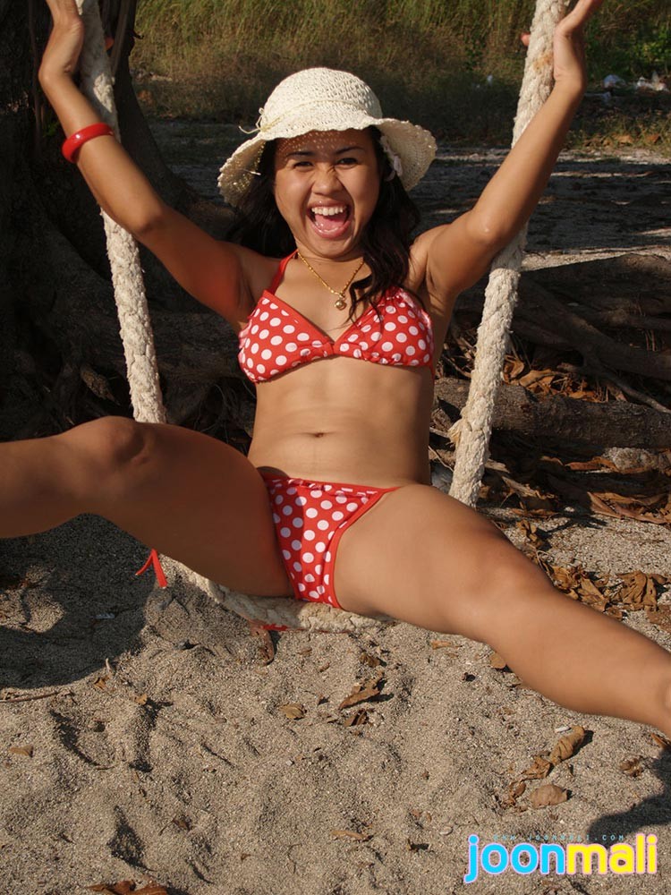 Thai girl in bikini outdoors #69969331